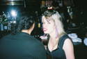 Monica talks to Steve Blush at the bar