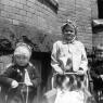 Dear Grandma,
Here I am on the extreme left in my red Norwegian hat with my two playmates.
All my love, Baby Suzanne
1950